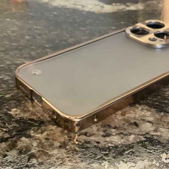 Like new iPhone 14 pro gold and clear metal case - Picture 3 of 3